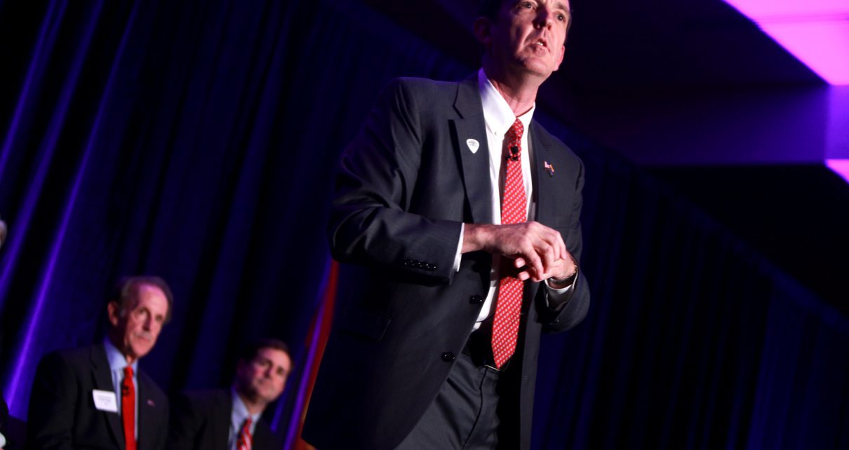 Secretary of State Ken Bennett, former Congressman Frank Riggs and Treasurer Doug Ducey speaking at the Arizona Chamber of Commerce & Industry's 2014 Manufacturer of the Year Awards in Phoenix, Arizona.