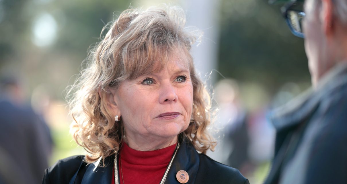 State Senator Christine Marsh speaking with supporters outside the Arizona State Capitol building on the opening day of the 56th Legislature in Phoenix, Arizona.