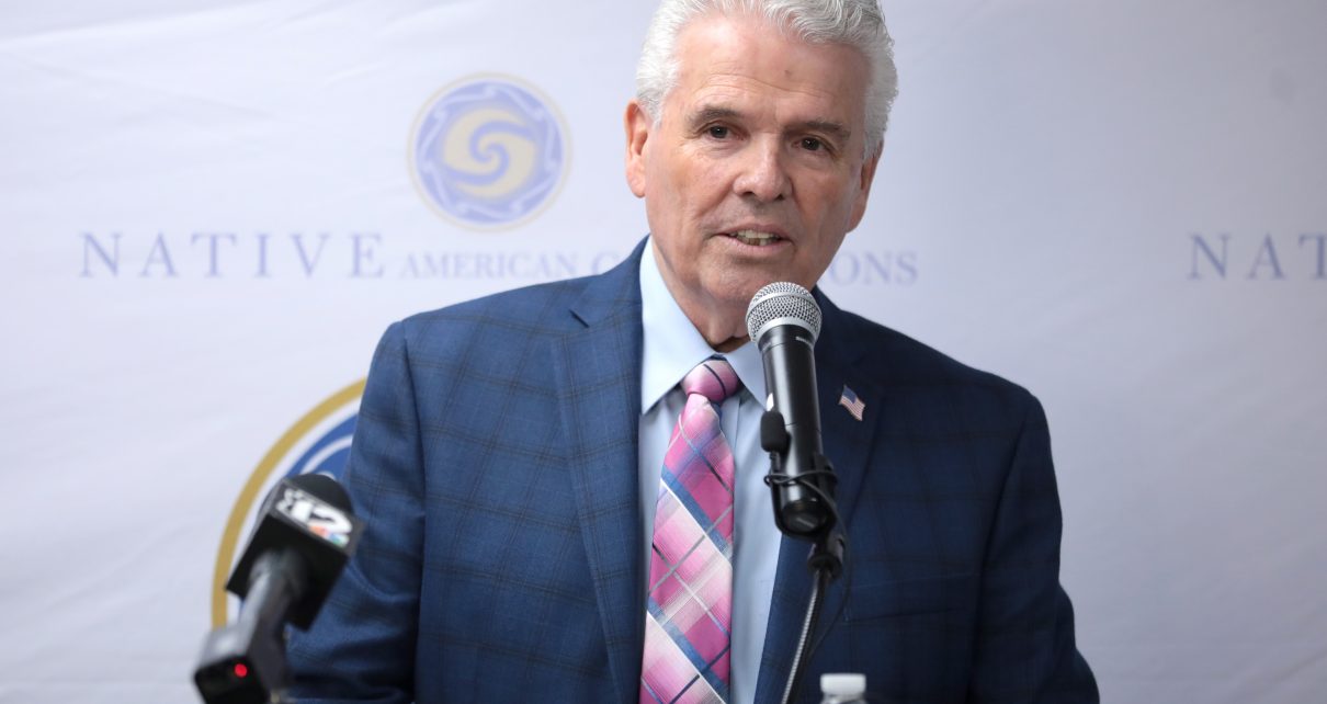 Surprise Mayor Skip Hall speaking with attendees at the grand opening of Homebase hosted by Native American Connections in Surprise, Arizona