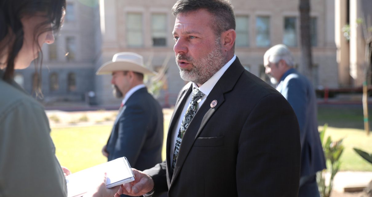 State Representative John Gillette speaking with the media at a press conference hosted by Border 911 at the Arizona State Capitol building in Phoenix, Arizona.