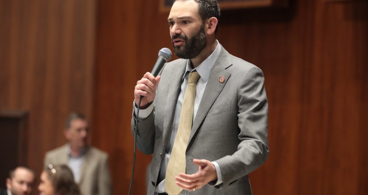 State Representative Alexander Kolodin speaking on the floor of the Arizona House of Representatives at the Arizona State Capitol building in Phoenix, Arizona.