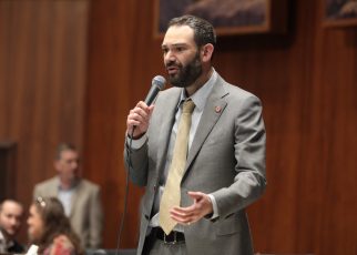 State Representative Alexander Kolodin speaking on the floor of the Arizona House of Representatives at the Arizona State Capitol building in Phoenix, Arizona.